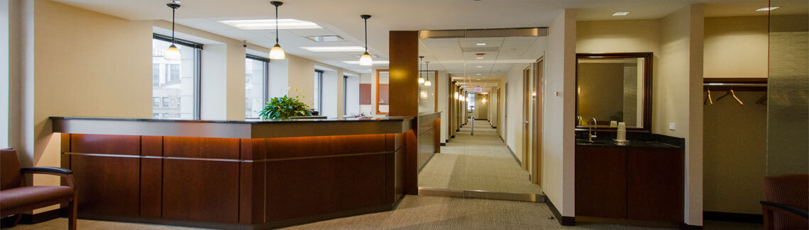 Picture of a beautiful dental office interior in Costa Rica.  The picture colors are brown, tan and white.